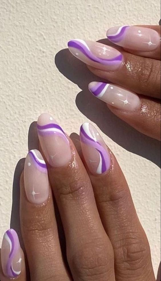 Cliomakeup-unghie-pastle-pop-purple-swirl-nails